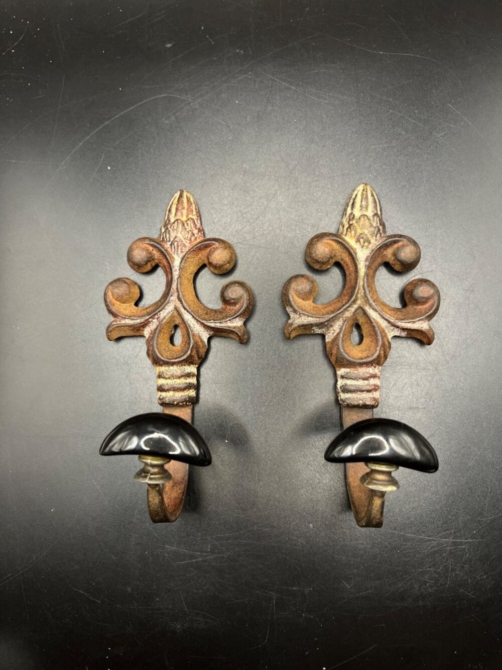 Vintage Pair Cast Iron Fleur-De-Lis Wall Hooks Black Ceramic Knobs Patina Gothic